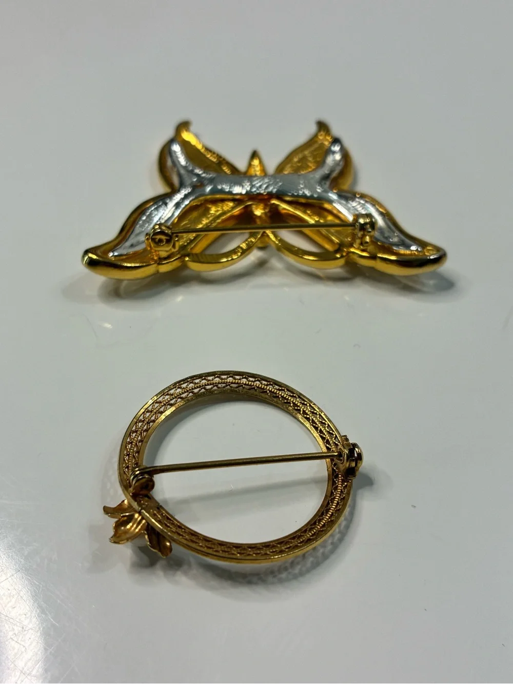 Two-Tone Gold and Silver Butterfly Brooch and Classic Infinity Floral Pin